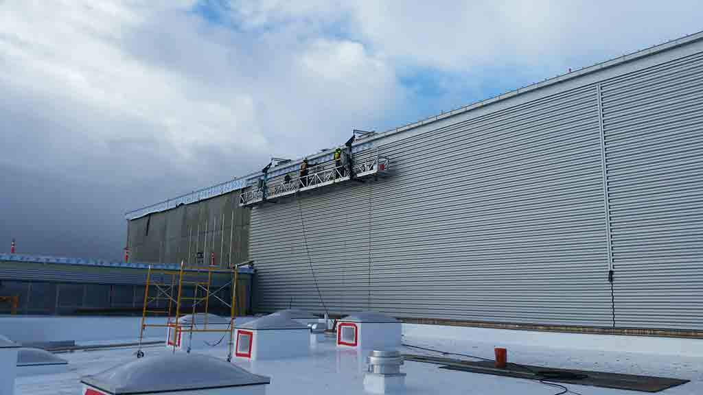 bonded sheet metal commercial seamless roofing installation seattle portland pacific northwest centralia community college